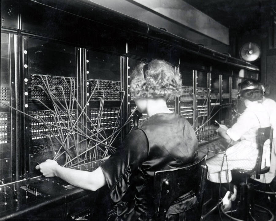 Women working the switchboard at Interstate Utilities Co. in Wallace, Idaho.