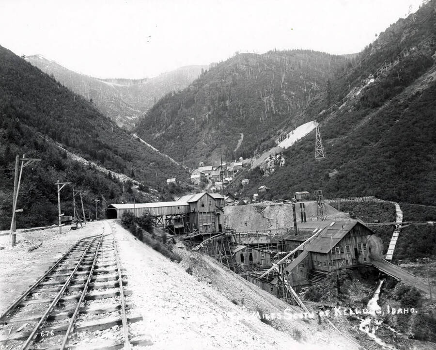Image shows railroad tracks going to the Bunker Hill and Sullivan Mine in Kellogg, Idaho.