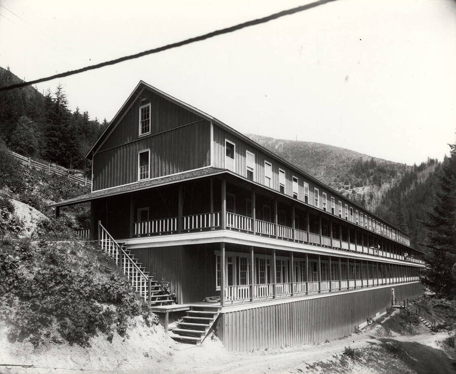 Exterior view of the Snowstorm Boarding House in Mullan, Idaho. This boarding house was steam-heated and had individual rooms for miners to stay in. It was located between No.3 and No.4 tunnels.