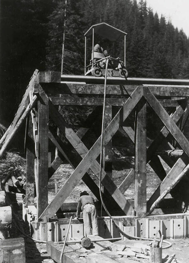 Men working with a hoist at the mine on Rock Creek, west of Mullan, Idaho.