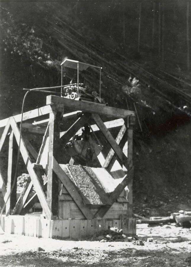 Men working with a hoist at the mine on Rock Creek, west of Mullan, Idaho.