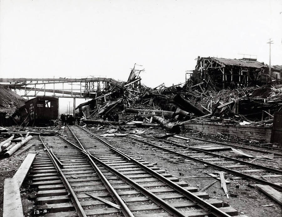 Image shows the debris of Bunker Hill and Sullivan Mill after the explosion in Wardner, Idaho [1899].   Caption on image: "Bunker Hill Mill and other buildings were destroyed by explosion set by strikers on April 29, 1899."