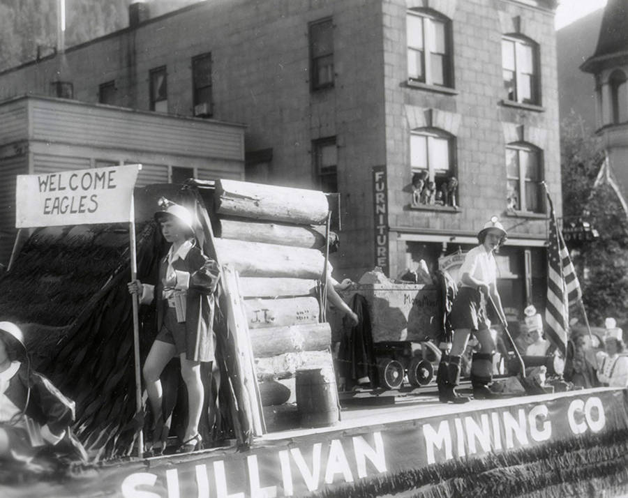 A float with "Sullivan Mining Co." written on it driving in the Eagles parade in Wallace, Idaho.