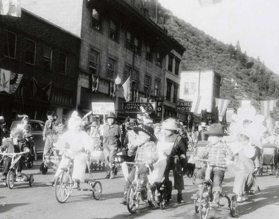 Children riding bikes in the Eagles parade in Wallace, Idaho.
