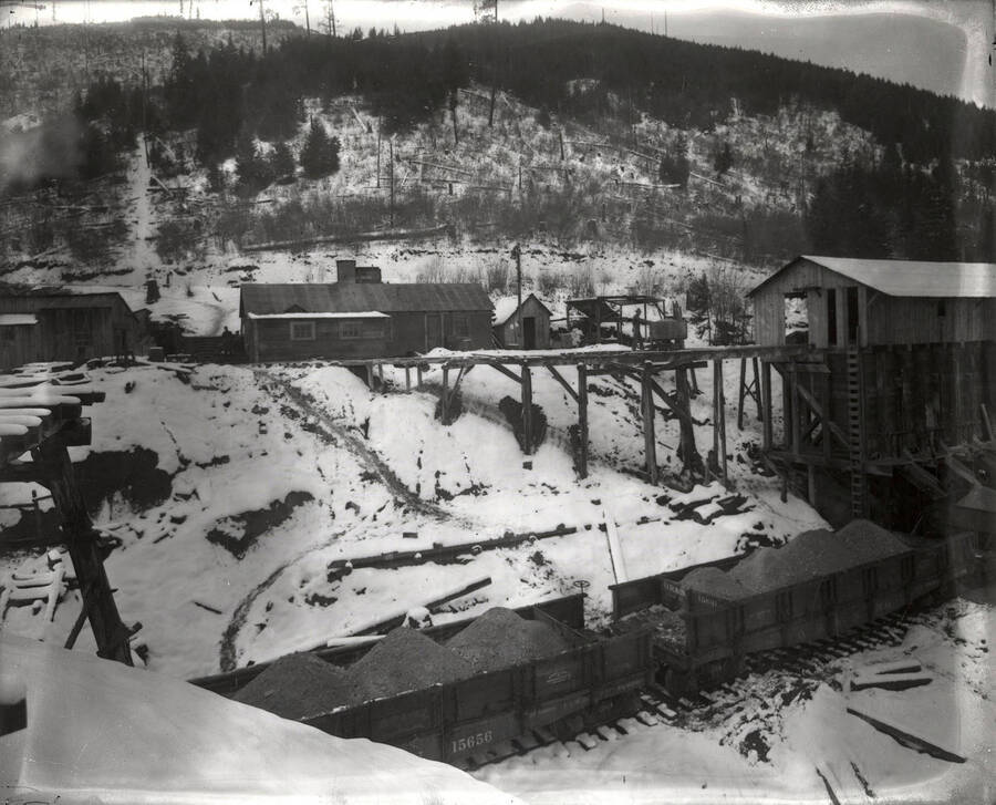 The  railroad ore cars surrounded by snow on Stewart Mine in Wallace, Idaho.