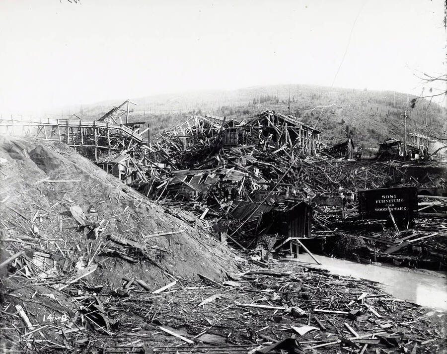Image shows the debris of Bunker Hill and Sullivan Mill after the explosion in Wardner, Idaho [1899]. Caption on image: "Wreckage of the $200,000 mill after 1 1/2 tons of dynamite had been set off by strikers on April 29, 1899."