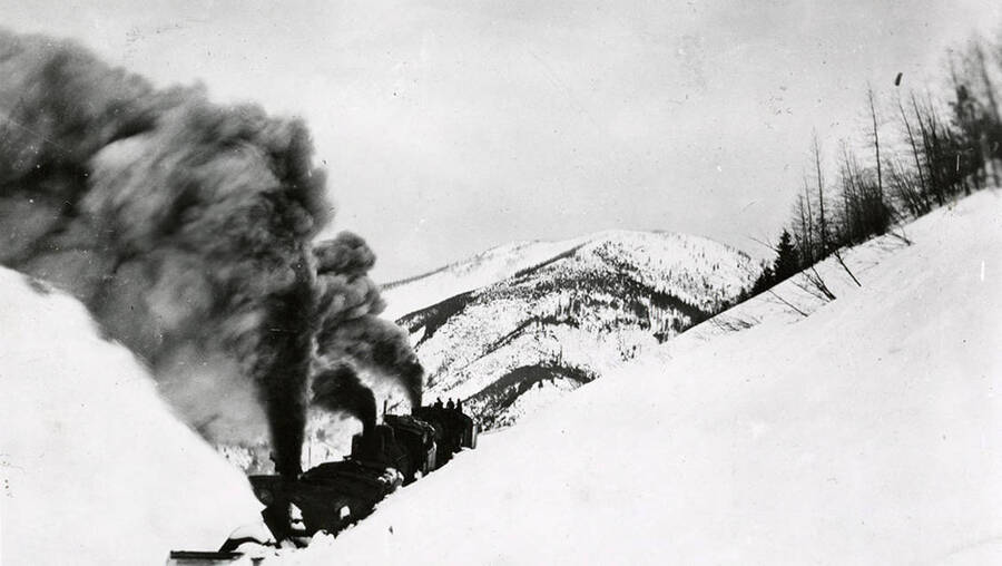 The rotary snow plow plowing the Northern Pacific Railroad.