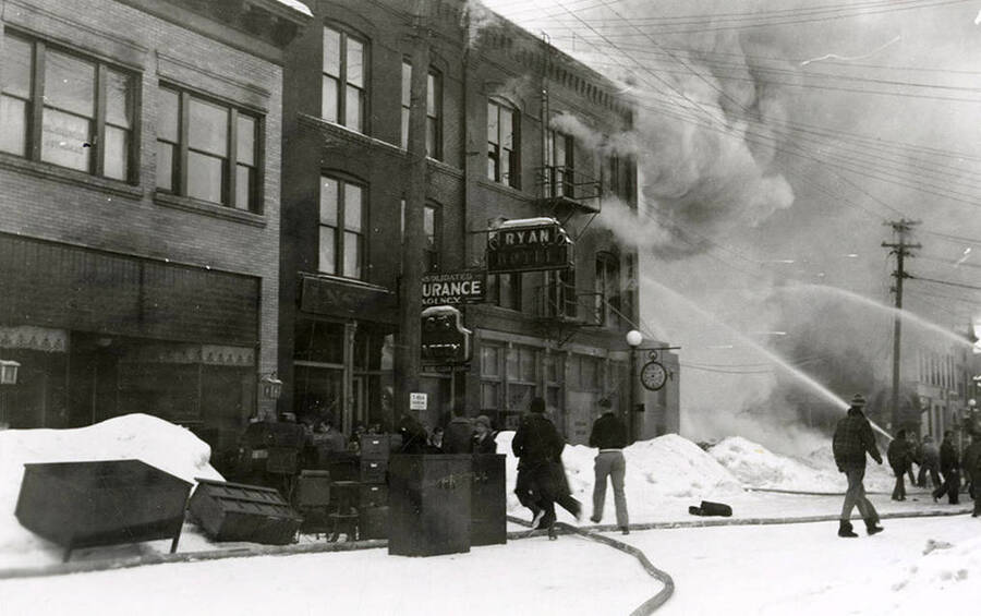 People putting out the fire at the Ryan Hotel on Cedar Street in Wallace, Idaho.