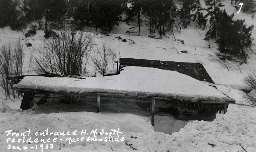 View of the front entrance to H.M. Scott residence buried in snow after a snow slide in Mace, Idaho.