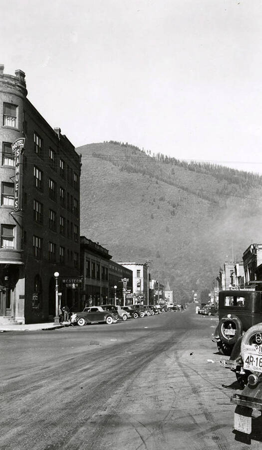 Looking west down Cedar Street in Wallace, Idaho. Samuels Hotel can be seen on the left.
