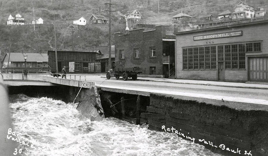 View of the retaining wall on Bank Streets during the Placer Creek flood in Wallace, Idaho.