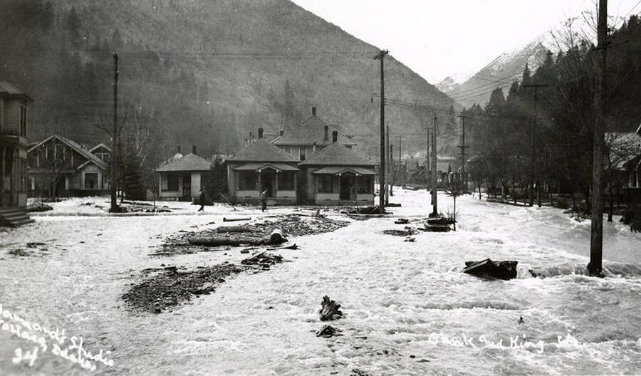 View of Bank and King Street during the Placer Creek flood in Wallace, Idaho.