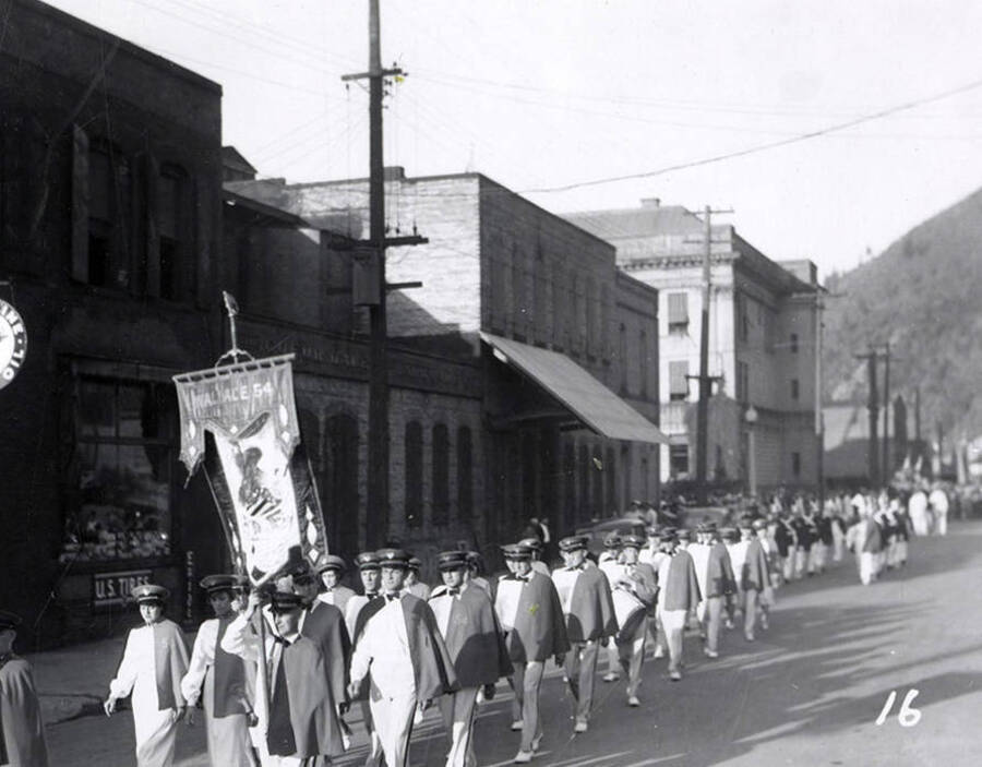 A group of people marching in the Eagles Parade in Wallace, Idaho.