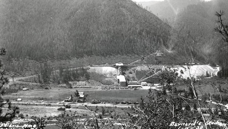 View of the buildings and mountains on the Polaris Mine in Wallace (i.e. Osburn), Idaho. The Polaris mill and change house can be seen.