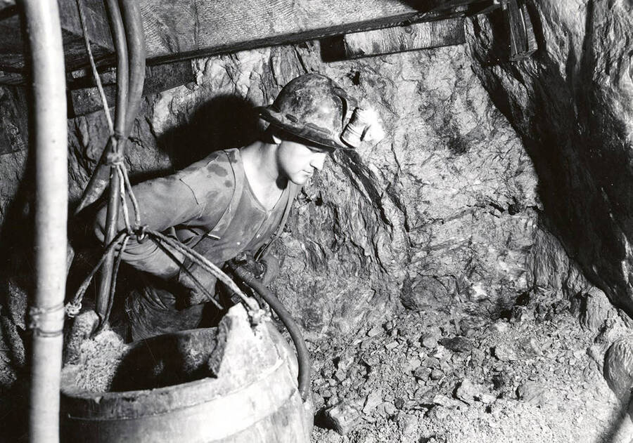 Ernest E. Gnaedinger drilling underground in the Silver Dollar Mine in Osburn, Idaho.