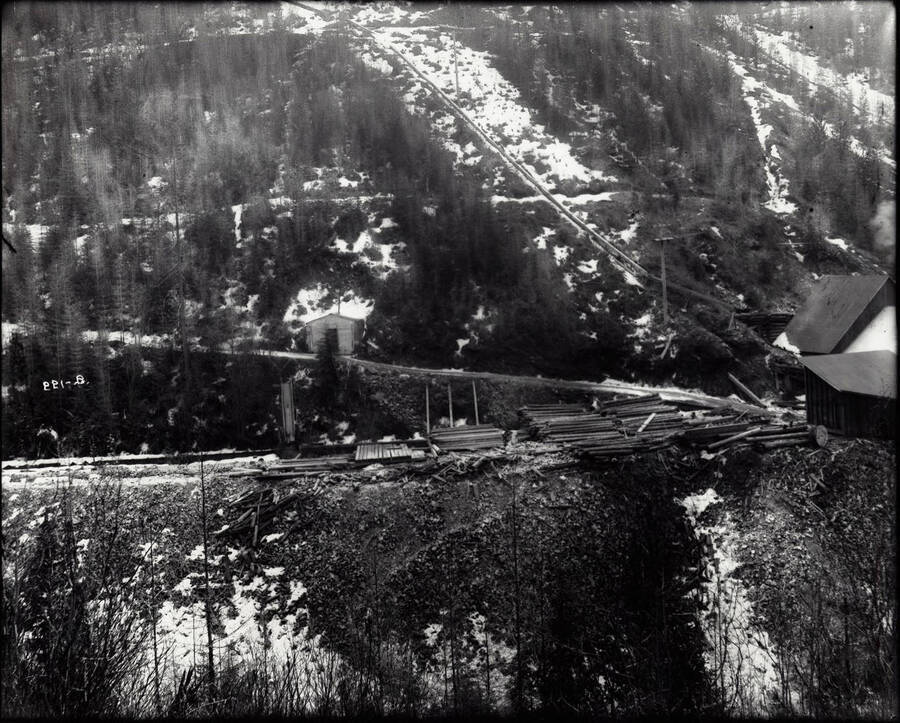 Distant view of the hillside. Caption on front: "Success Mine, Wallace, Idaho."