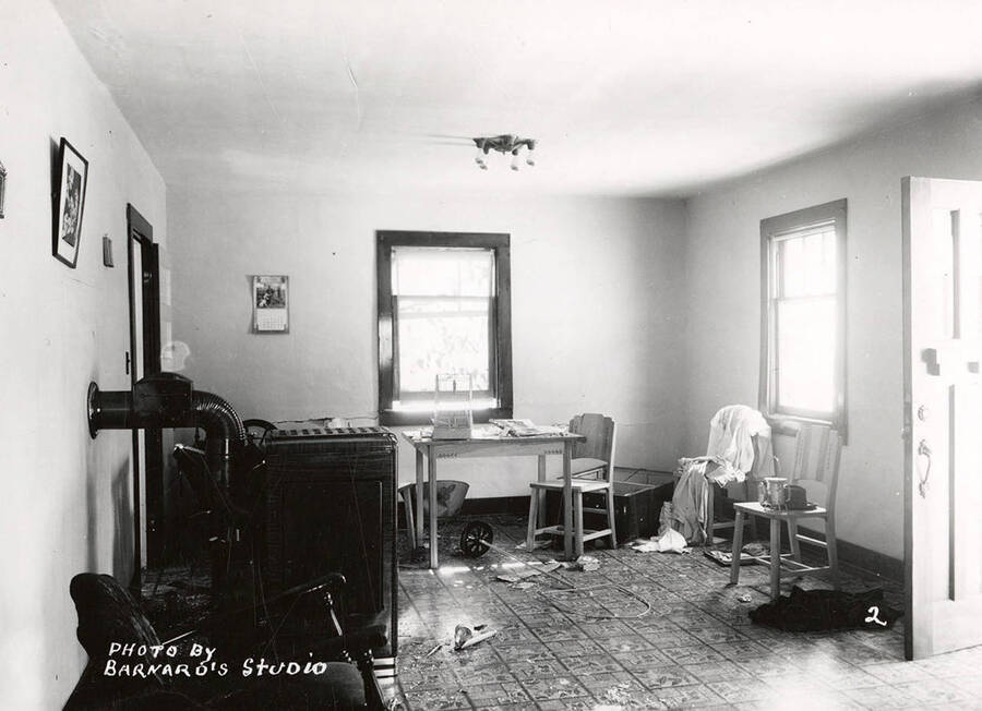 Damage to the living room of the N.J. Osborne home, caused by the sunshine powder magazine explosion at the mouth of Big Creek.