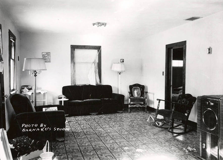 Damage to the living room of the N.J. Osborne home, caused by the sunshine powder magazine explosion at the mouth of Big Creek.