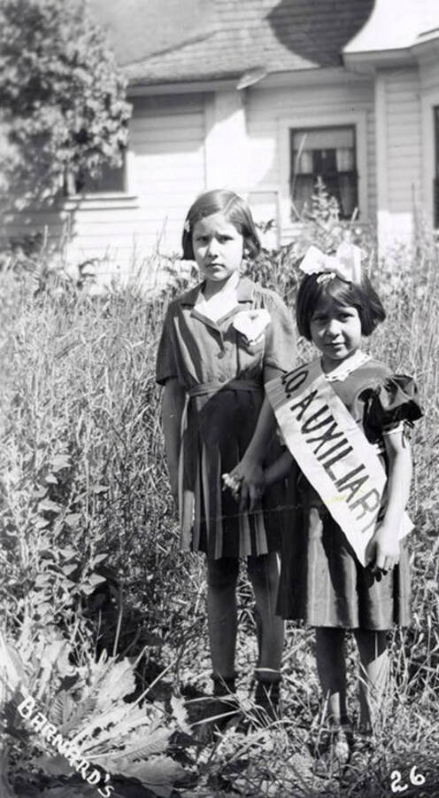 Two girls in costume for the Mullan 49'er parade in Mullan, Idaho.