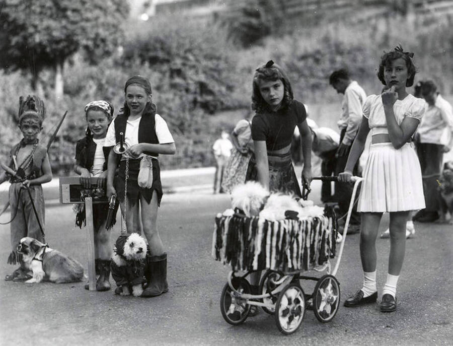 Children in costume with their pets during the Slippery Gulch parade in Wallace, Idaho.
