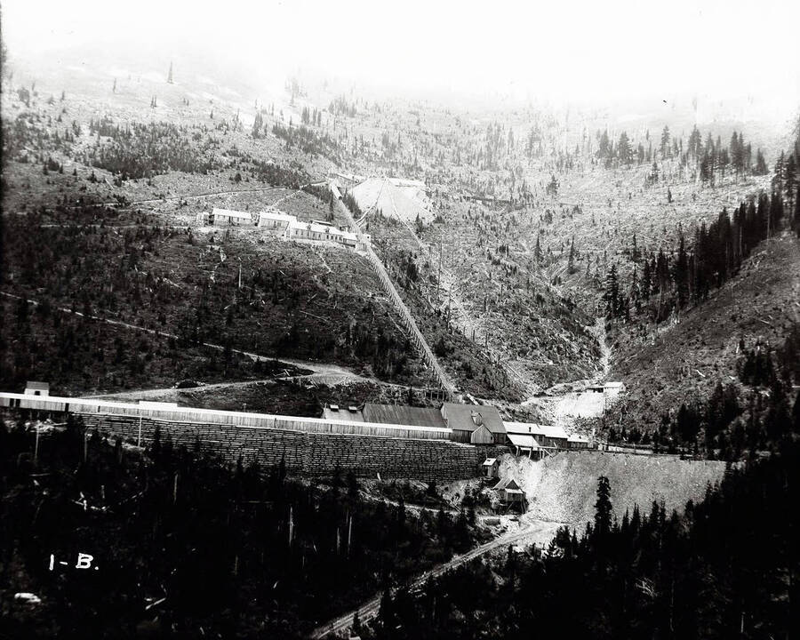 A distant view of Hercules Mine in Burke, Idaho. A road or railway has been added.