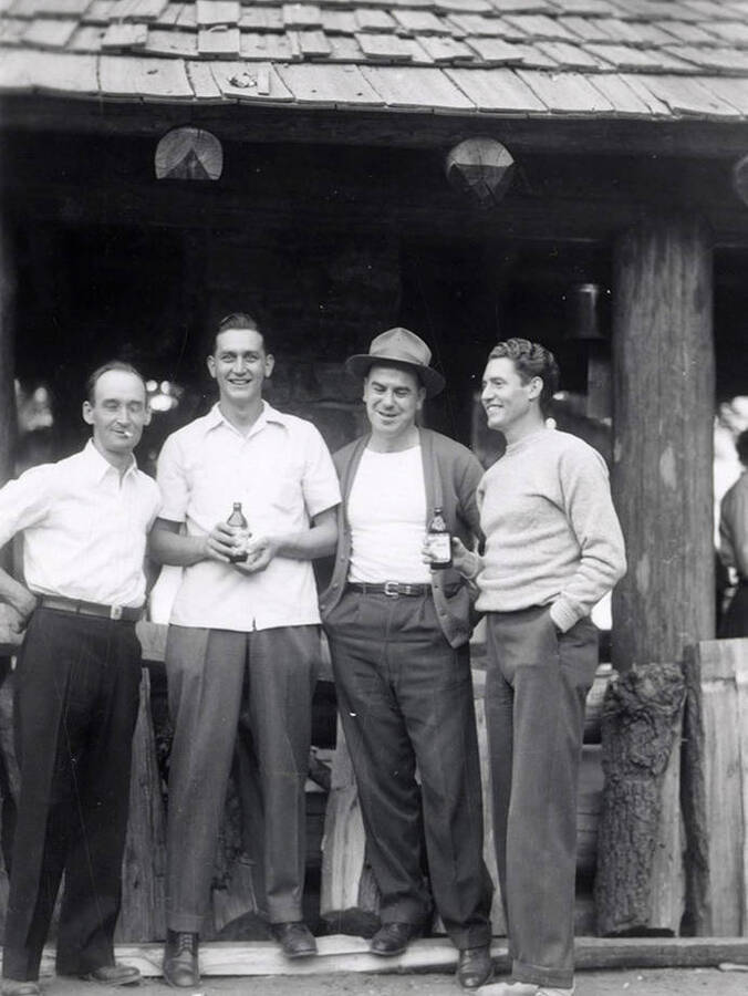 A group of men standing together during Wallace Jaycee's picnic in Pottsville, Idaho.
