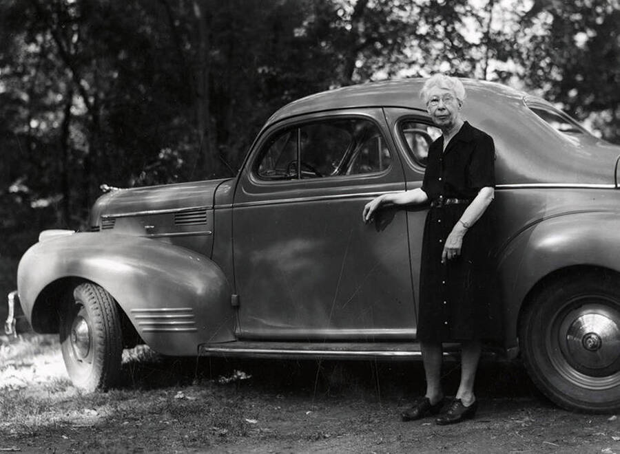 Nellie Stockbridge standing near a car during the Heilbronner Family Missoula trip.