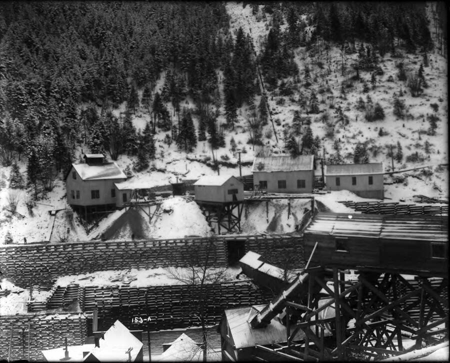 Snow-covered, exterior view of lower tunnel no. 5 at the Hercules Mine in Burke, Idaho.