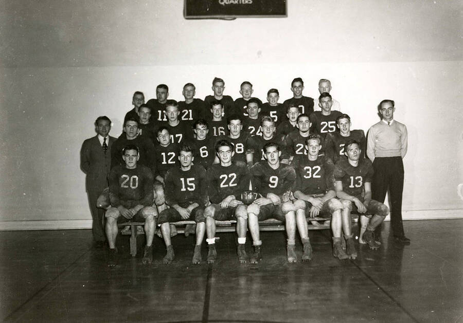 The football team posing for a team picture at Wallace High School in Wallace, Idaho.