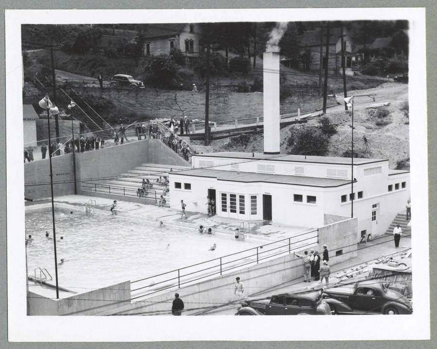 People swimming in the Wallace Swimming Pool. The pool is owned by the City of Wallace and was constructed in 1939 under a public works program of the federal government.