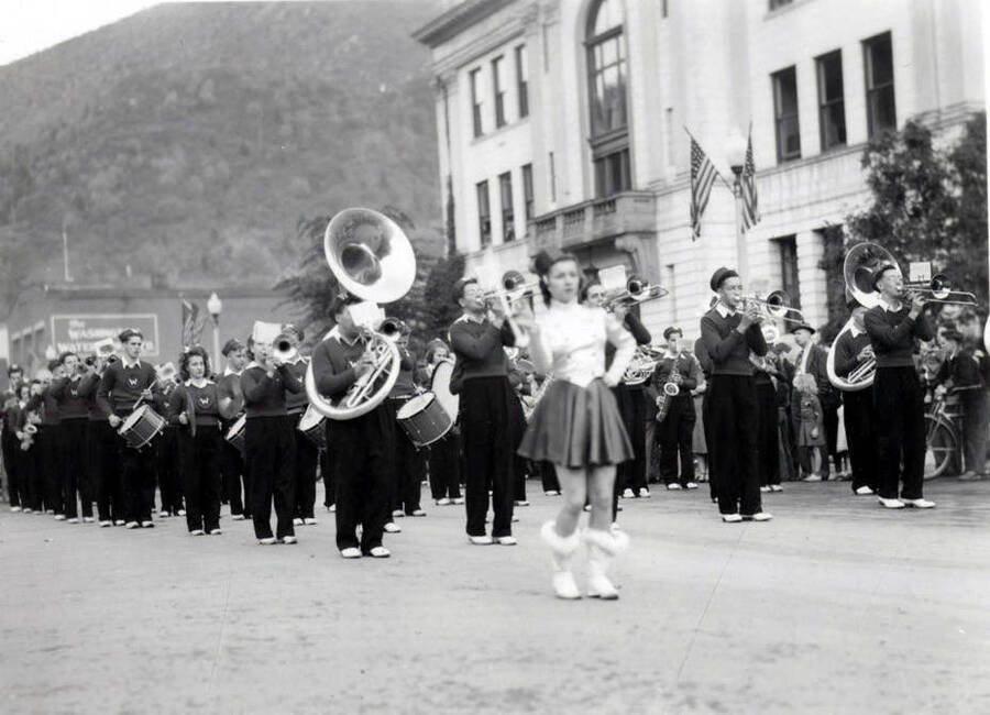 A marching band moving down the street during the Elks Round Up Parade.