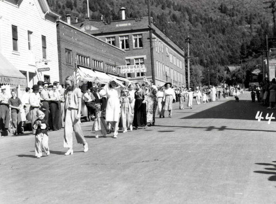 Children in costume marching along during the 49'er Parade in Mullan, Idaho.