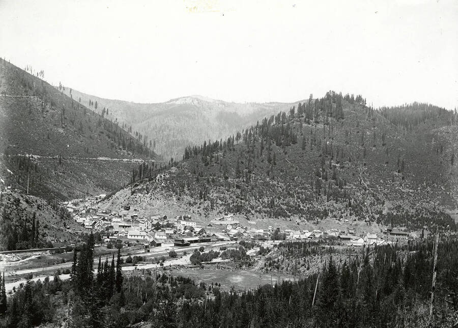 View of Mullan, Idaho, surrounded by mountains.