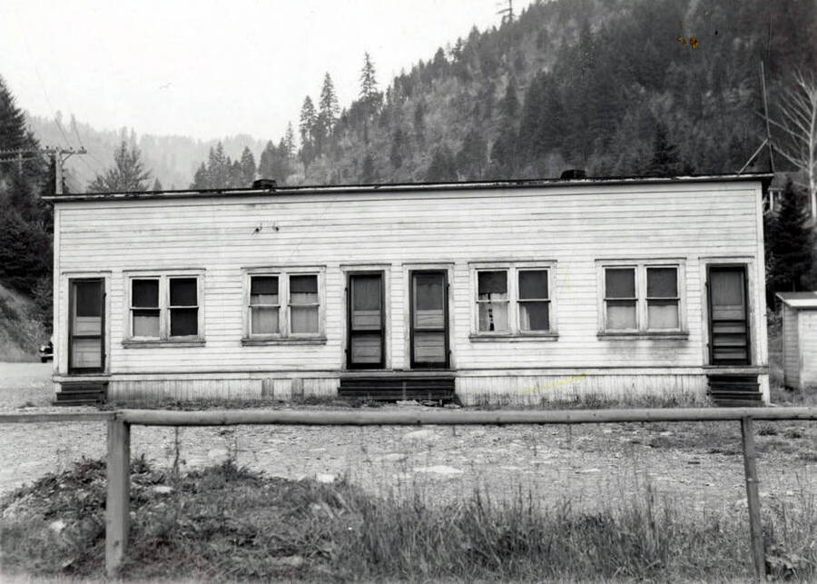 A photograph of the Walker Apartments in Wallace, Idaho, taken for Consolidated Insurance Company.