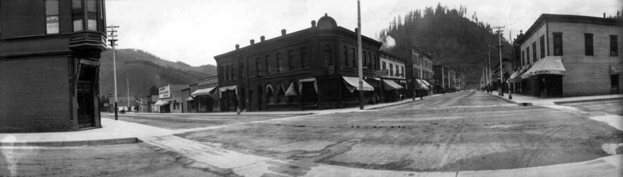 View of street corner in town. Panoramic photograph of Wallace, Idaho.