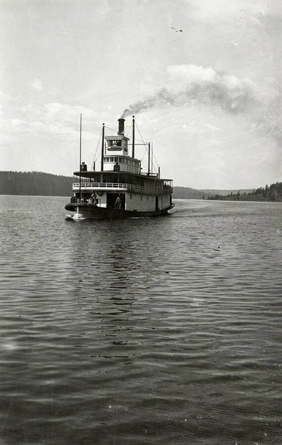 View of the Steamboat "Georgie Oakes" on Lake Coeur d'Alene. The steamboat was named after a daughter of the president of the Northern Pacific Railroad Company.