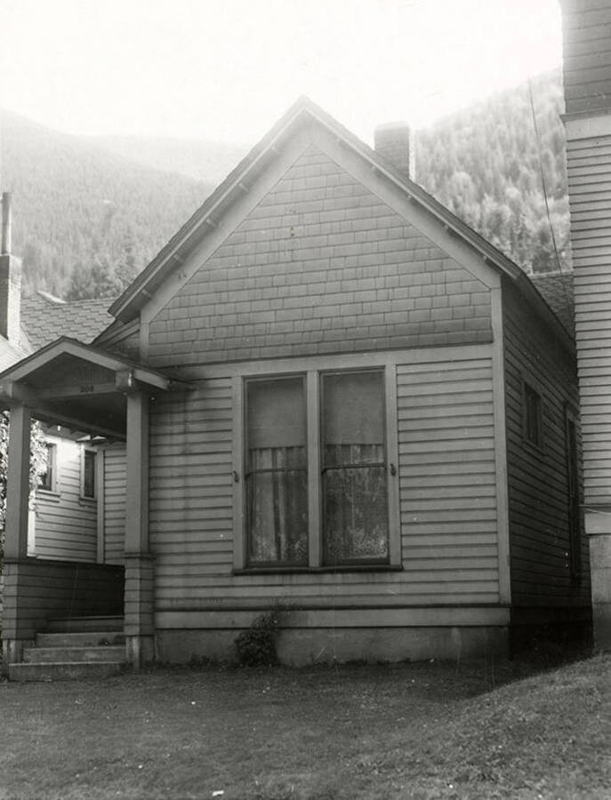 A photograph of a home in Wallace, Idaho, taken for J.A. Peterson Real Estate Company.