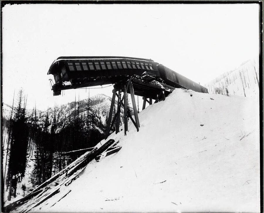 This photo of the 1903 "S" bridge wreckage is taken from the bottom of the gulch, looking up at the dangling passenger car.