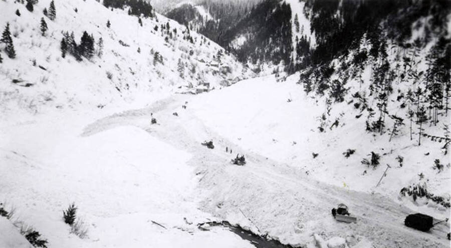 A view from a hillside of the damage caused by the snow slide in Mace, Idaho.