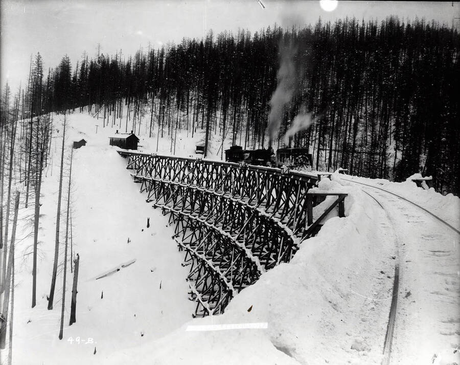 Image shows the  N.P. [Northern Pacific] train with rotary plow.