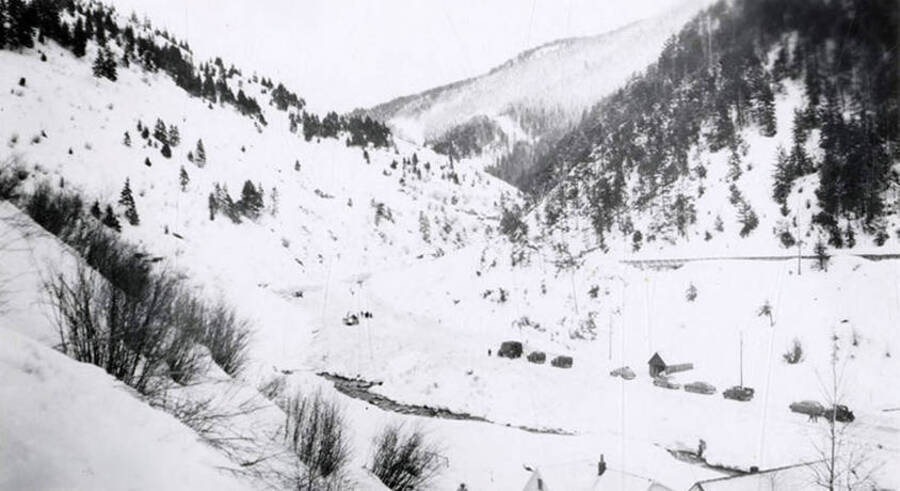A hillside view of the road going into Mace, Idaho, after a snow slide.