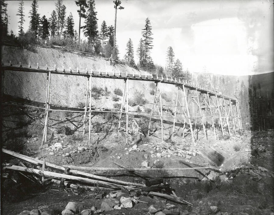 North side, Coeur d'Alene Mining District (Murray area). The flume is traveling around the natural curve of the land