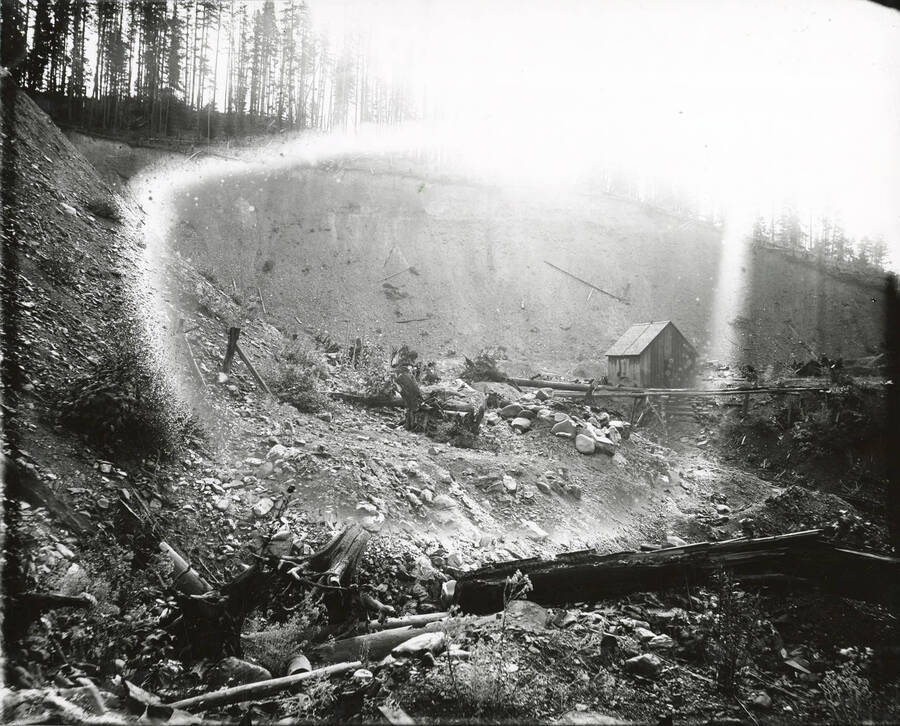 North side, Coeur d'Alene Mining District (Murray area). The photograph paper did not receive even lighting during processing, causing the halo in the middle of the image.