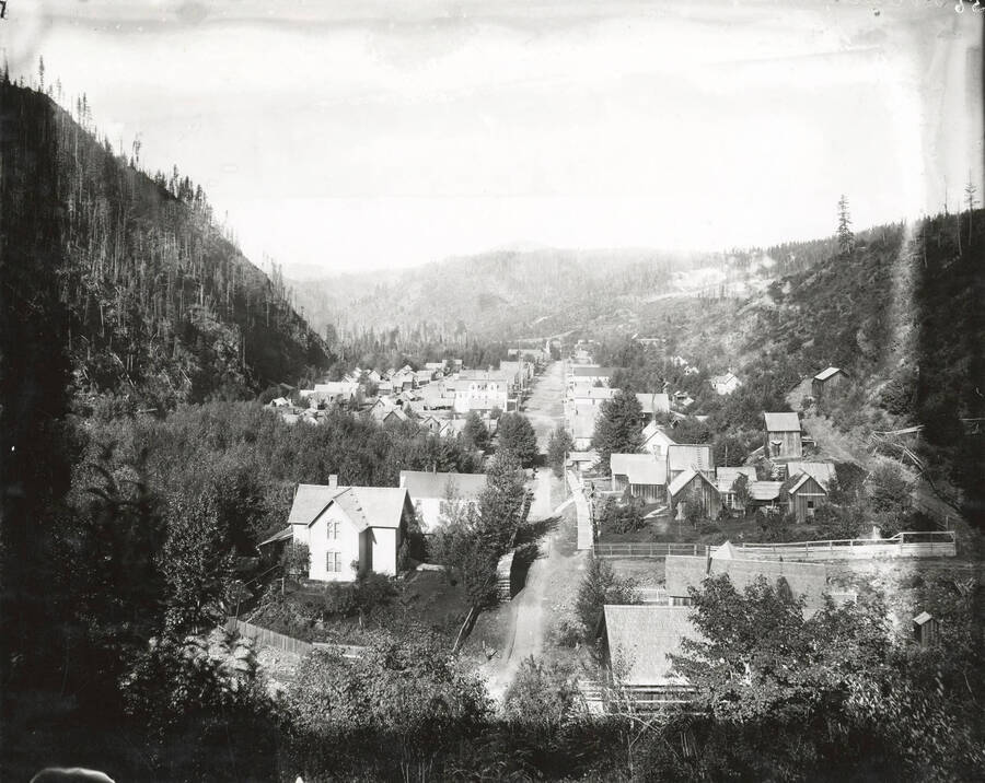 North side, Coeur d'Alene Mining District (Murray area). Several flumes and trenches can be seen through and around the town.