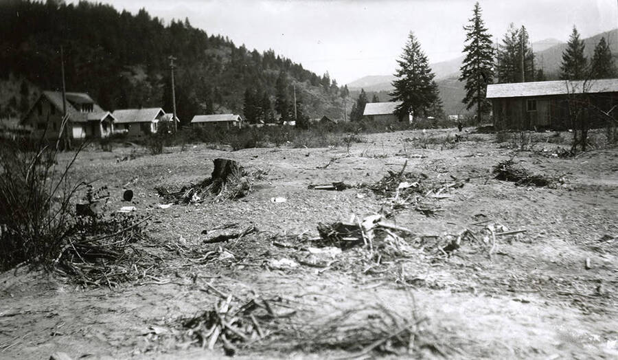 The Sunnyside Addition in Kellogg, Idaho during the flood of 1933. View taken when looking east on Riverdale from the hill. On the left, the house belonging to William Penney, Sr. can be seen.