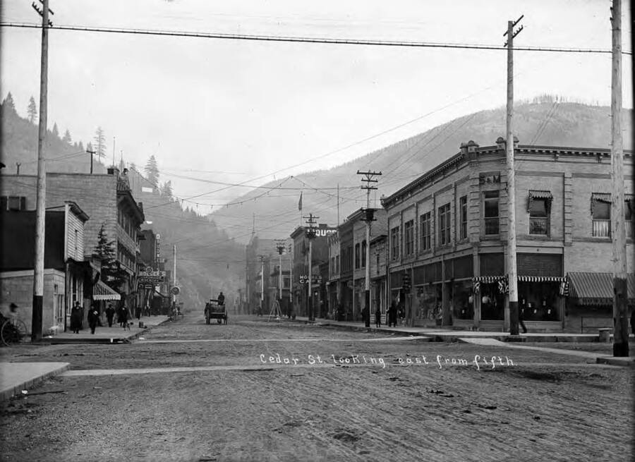 Image shows Cedar St. looking east from fifth in Wallace, Idaho.