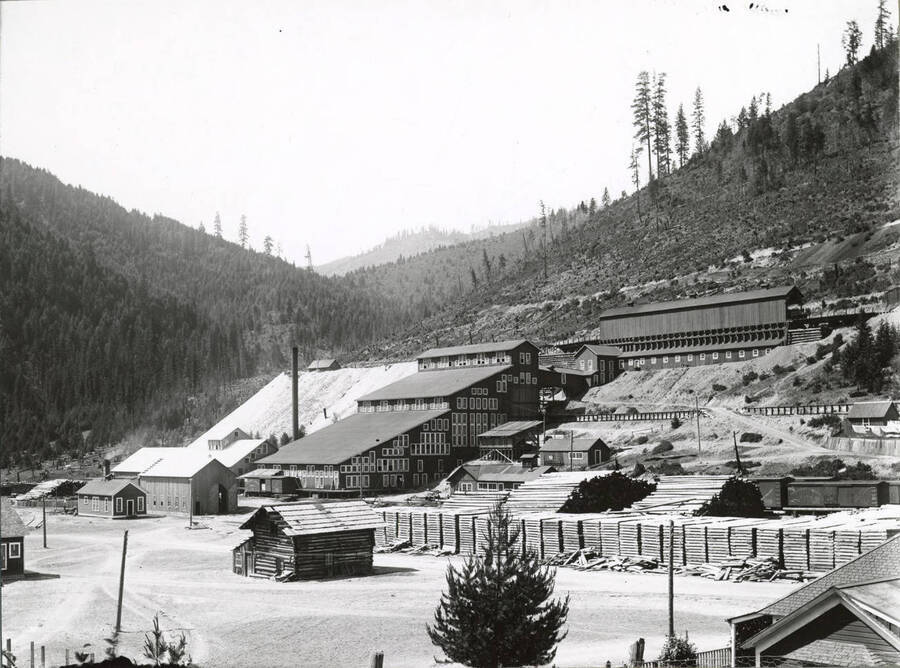 A closer view of Morning Mill in Mullan, Idaho, still looking down the valley. The levels and floors of the building in the center of the photograph are the focal point in this picture.