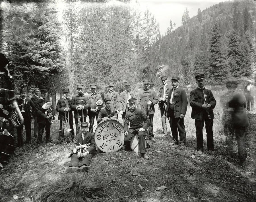 Group photos of the F.O.E. Wallace Aerie No. 54 at the band's first annual picnic in Saltese, Montana.