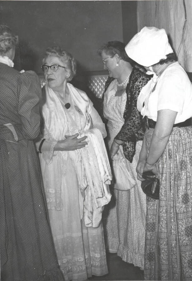 Photograph of Mrs. Kingsbury (facing camera) and a group of women at the North Idaho Press Jubilee.