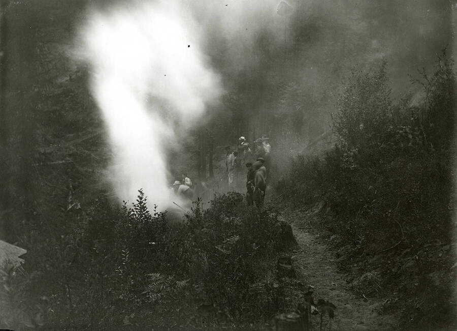 Fighting the "Big Burn" forest fire of 1910 on the hill opposite 6th Street in Wallace, Idaho.